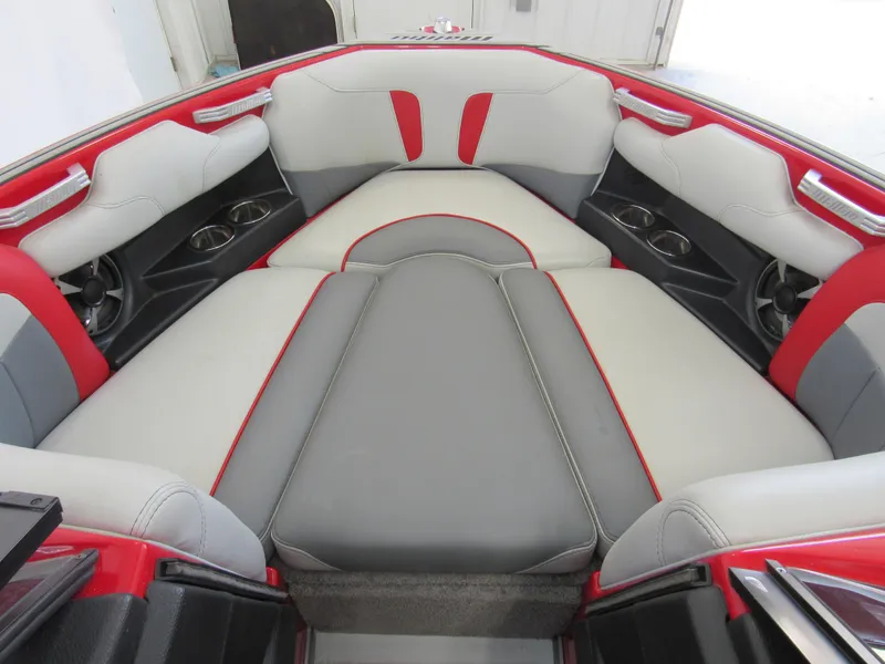Slide: The Image of 2019 Malibu Wakesetter 20 VTX interior with red and gray seating. - 8
