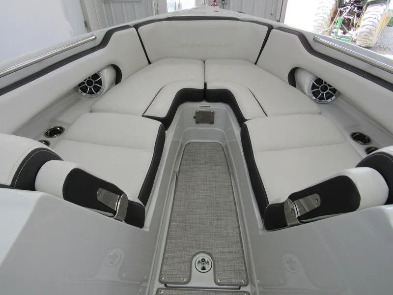 Slide: The Image of 2023 Crownline 270 SS boat interior with plush seating and modern design. - 10