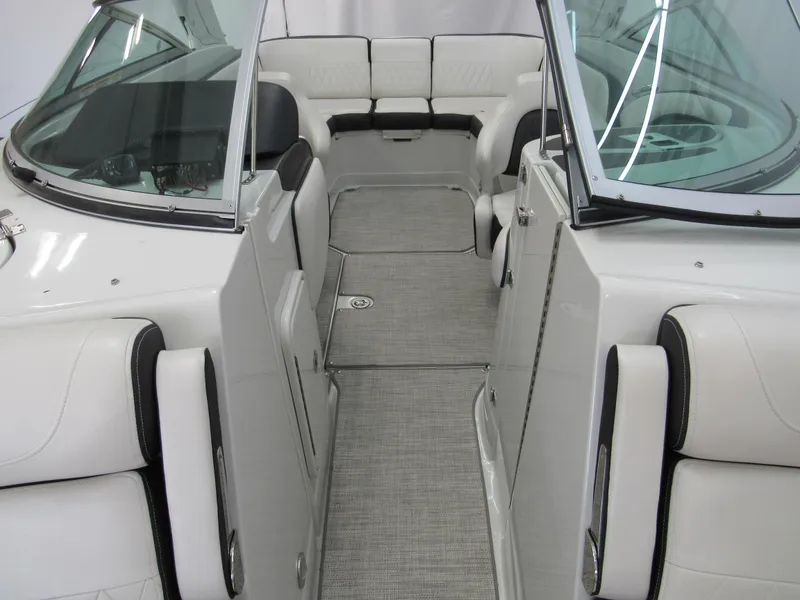 Slide: The Image of 2023 Crownline 270 SS boat interior with sleek seating and modern design. - 11