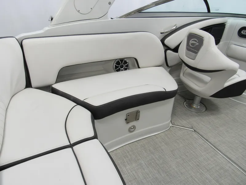 Slide: The Image of 2023 Crownline 270 SS boat interior with white seating and modern design. - 6