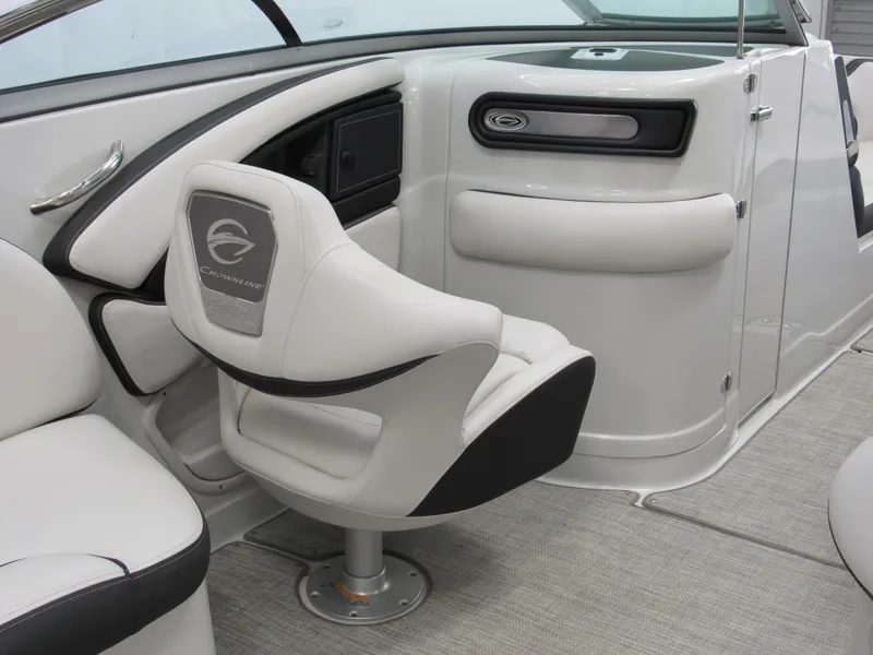 Slide: The Image of 2023 Crownline 270 SS boat interior with sleek seating and modern design. - 7