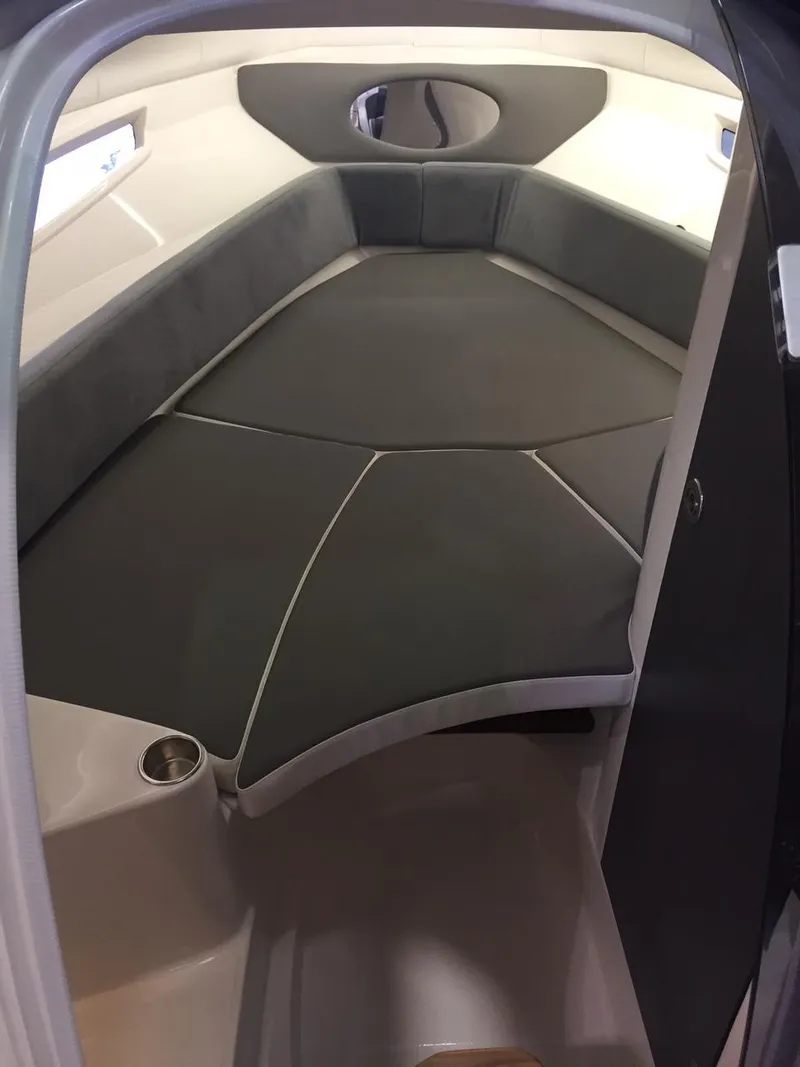 Slide: The Image of 2025 Hanover 305 boat interior with sleek seating and modern design. - 4