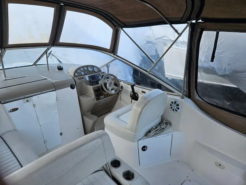 Slide: The Image of 2001 Bayliner 2655 Cierra boat interior with helm, seating, and dashboard. - 19