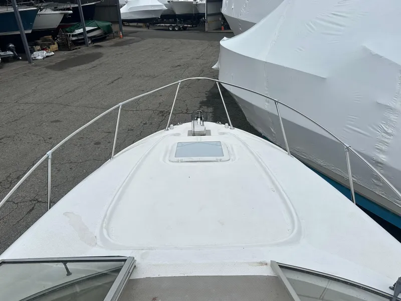 Slide: The Image of 2001 Bayliner 2655 Cierra boat deck view in storage facility. - 47