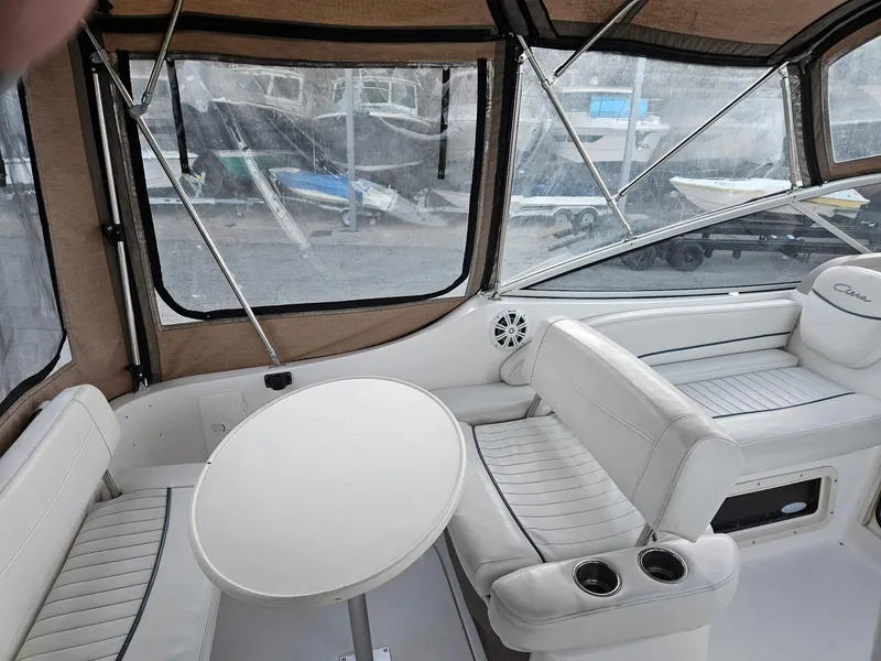 Slide: The Image of Interior of 2001 Bayliner 2655 Cierra boat with seating and table. - 9