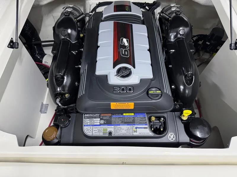 Slide: The Image of 2025 Chaparral 23 SSi boat engine compartment with a powerful 6.2L engine. - 23
