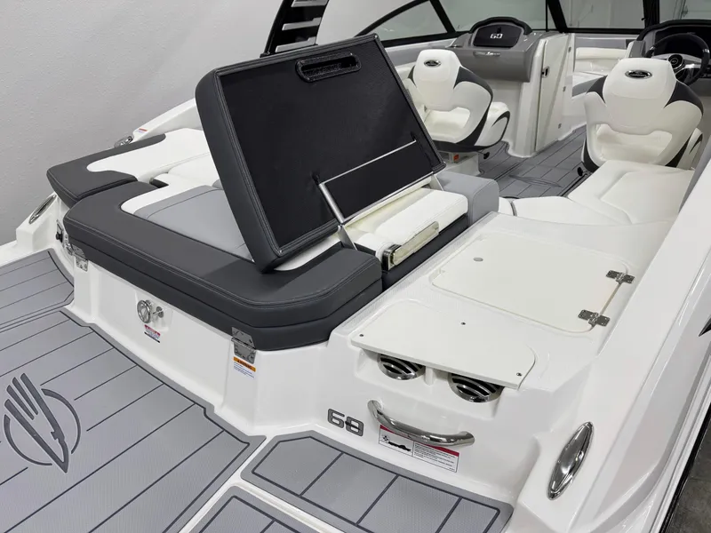 Slide: The Image of 2025 Chaparral 23 SSi boat interior with sleek seating and modern design. - 5