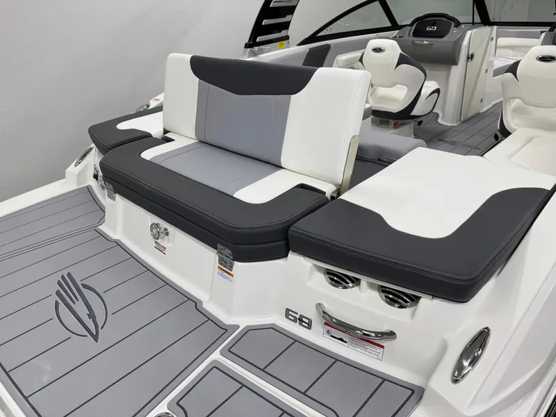 Slide: The Image of 2025 Chaparral 23 SSi boat interior with sleek seating and modern design. - 6