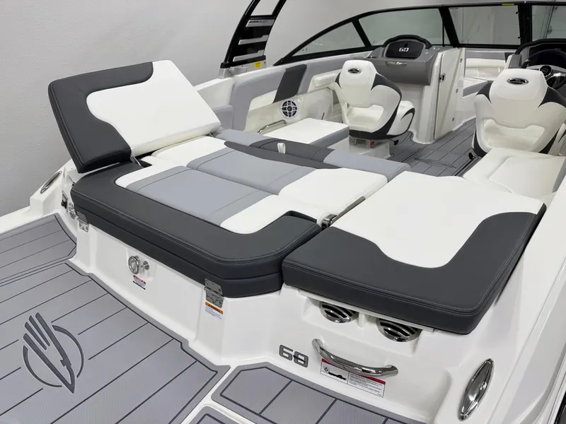 Slide: The Image of 2025 Chaparral 23 SSi boat interior with sleek seating and modern design. - 7