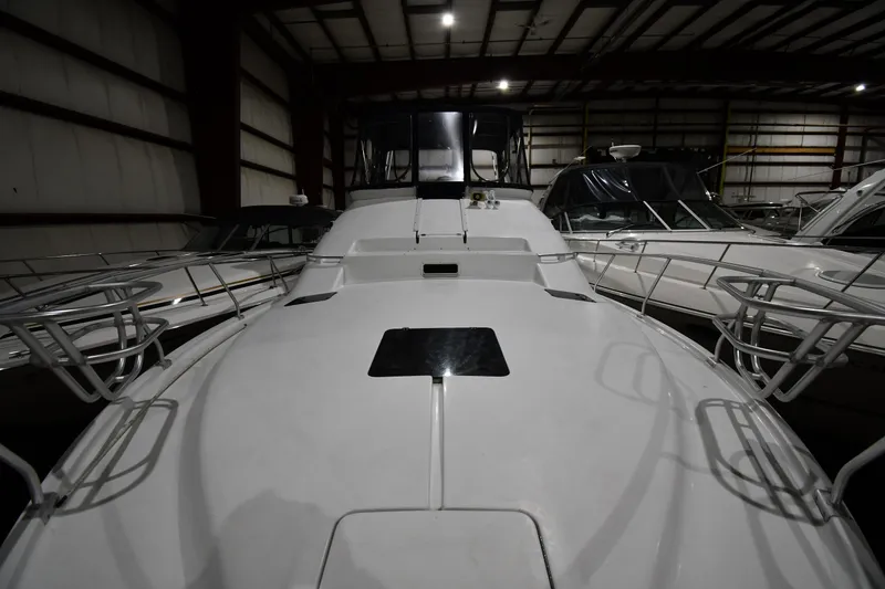 Slide: The Image of 1997 Mainship 40 Sedan Bridge yacht in indoor storage facility. - 4