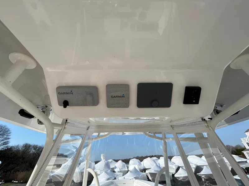 Slide: The Image of 2018 Regulator 31 boat with Garmin electronics on the console. - 17