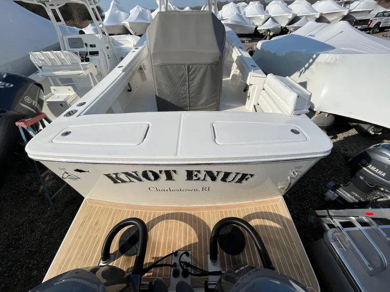 Slide: The Image of 2018 Regulator 31 boat named "Knot Enuf" in storage, Charlestown, RI. - 5