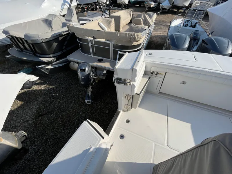 Slide: The Image of 2018 Regulator 31 boat in storage, surrounded by other boats. - 9