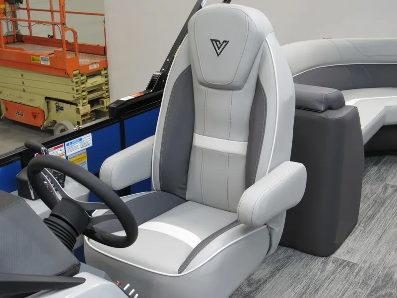 Slide: The Image of Captain's chair in 2025 Viaggio X24U boat, featuring sleek gray and white design. - 9