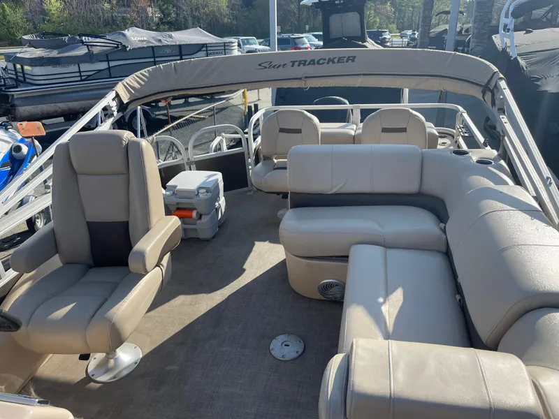 Slide: The Image of 2019 Sun Tracker SportFish 22 DLX pontoon boat with spacious seating and modern design. - 34