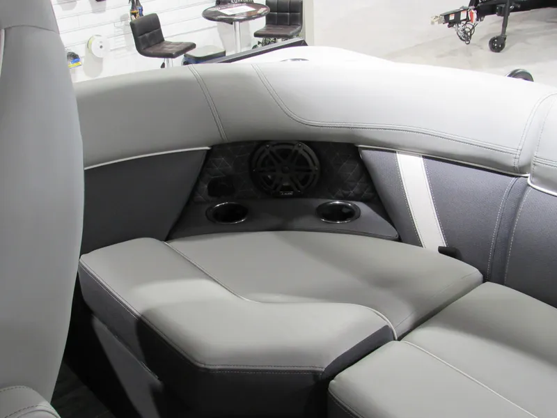 Slide: The Image of Luxurious seating area in 2025 Viaggio Z22Q boat with cup holders and speaker system. - 10