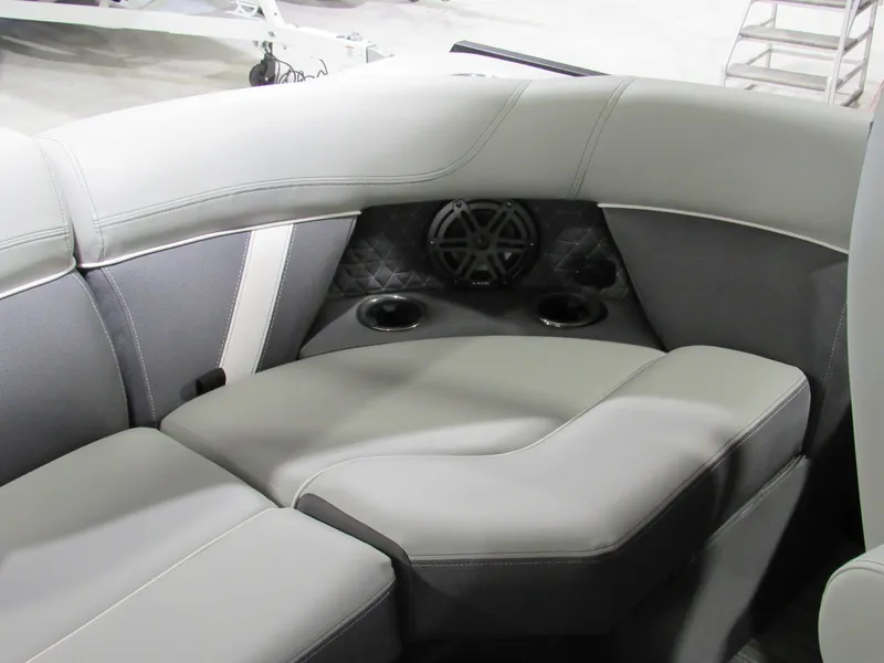 Slide: The Image of Luxurious seating area in 2025 Viaggio Z22Q boat with cup holders and speaker. - 9