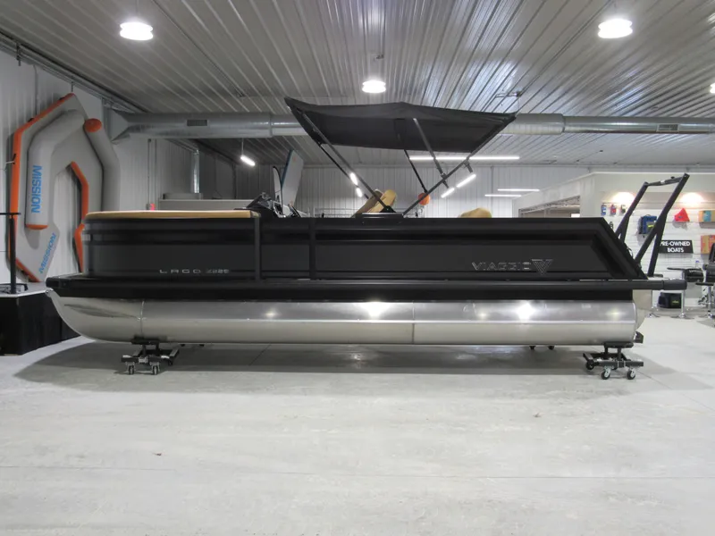 Slide: The Image of 2025 Viaggio Z22S pontoon boat displayed indoors, featuring sleek design and modern amenities. - 1