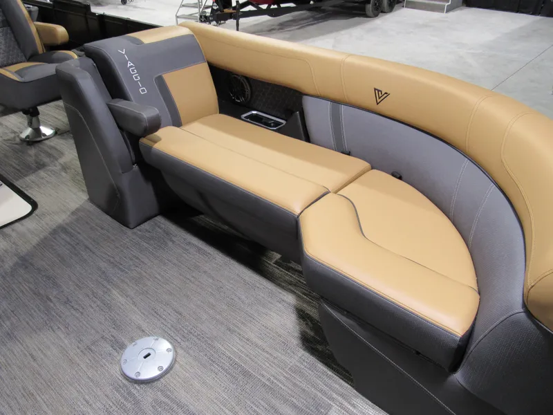 Slide: The Image of Luxurious seating in a 2025 Viaggio Z22S boat, featuring tan and gray upholstery. - 10