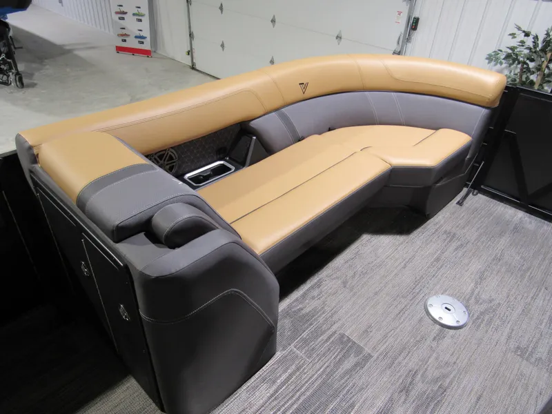 Slide: The Image of Luxurious seating in 2025 Viaggio Z22S boat, featuring tan and gray upholstery. - 7