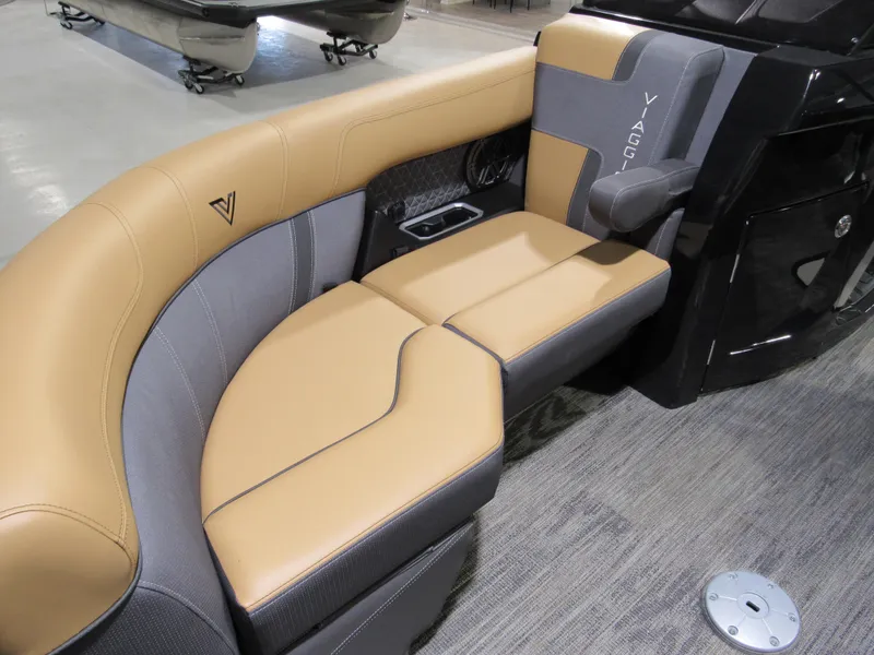 Slide: The Image of Luxurious seating in 2025 Viaggio Z22S boat, featuring tan and gray upholstery. - 9