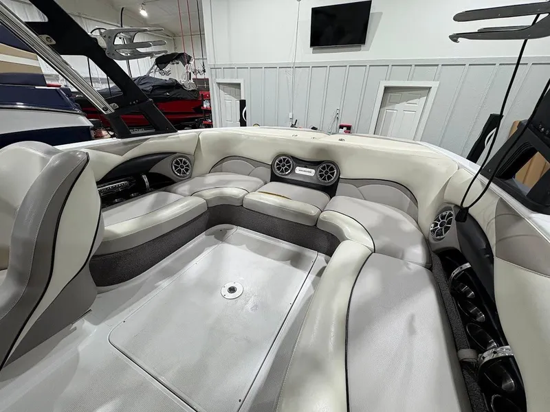 Slide: The Image of 2011 Malibu Wakesetter 21 VLX interior with spacious seating and modern design. - 13