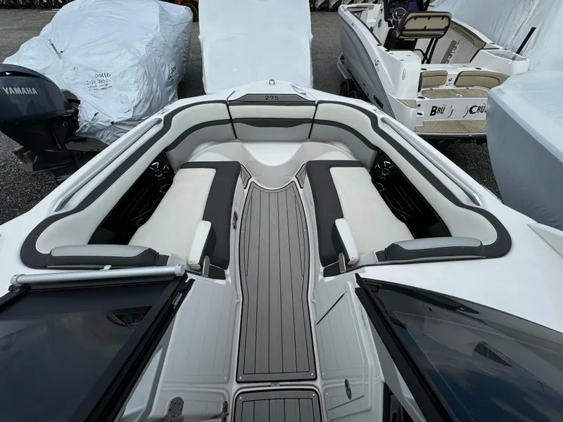 Slide: The Image of 2021 Yamaha Boats 275SE interior with sleek seating and modern design. - 11