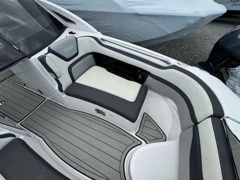 Slide: The Image of 2021 Yamaha Boats 275SE interior with sleek seating and modern design. - 15