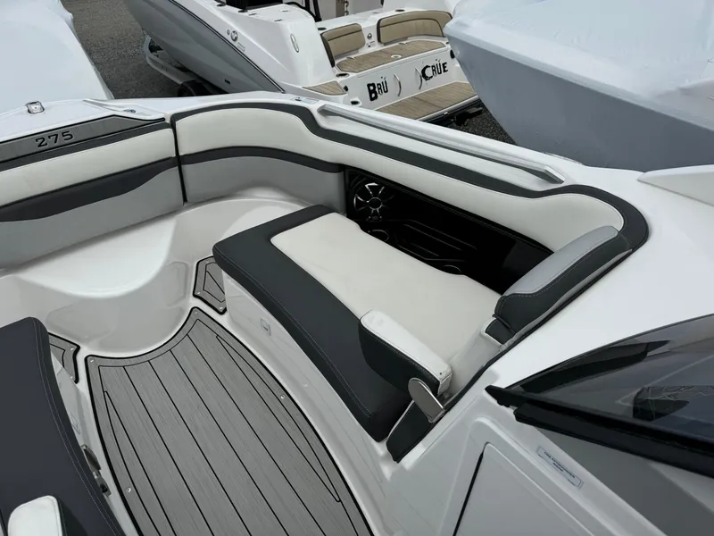 Slide: The Image of 2021 Yamaha Boats 275SE interior with sleek seating and modern design. - 17