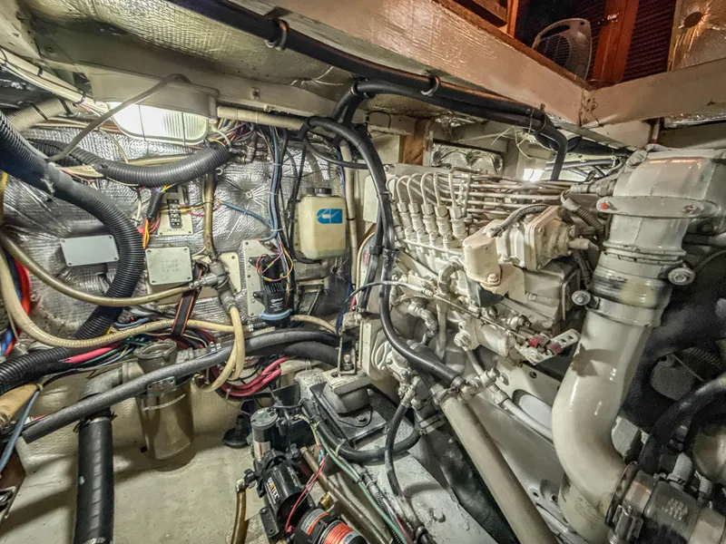 Slide: The Image of Engine room of 2000 Cherubini Independence boat with complex wiring and machinery. - 29