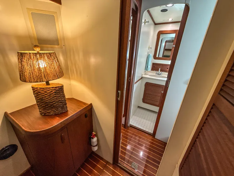 Slide: The Image of Luxurious Cherubini Independence 2000 yacht interior with elegant wood finishes and modern lighting. - 36