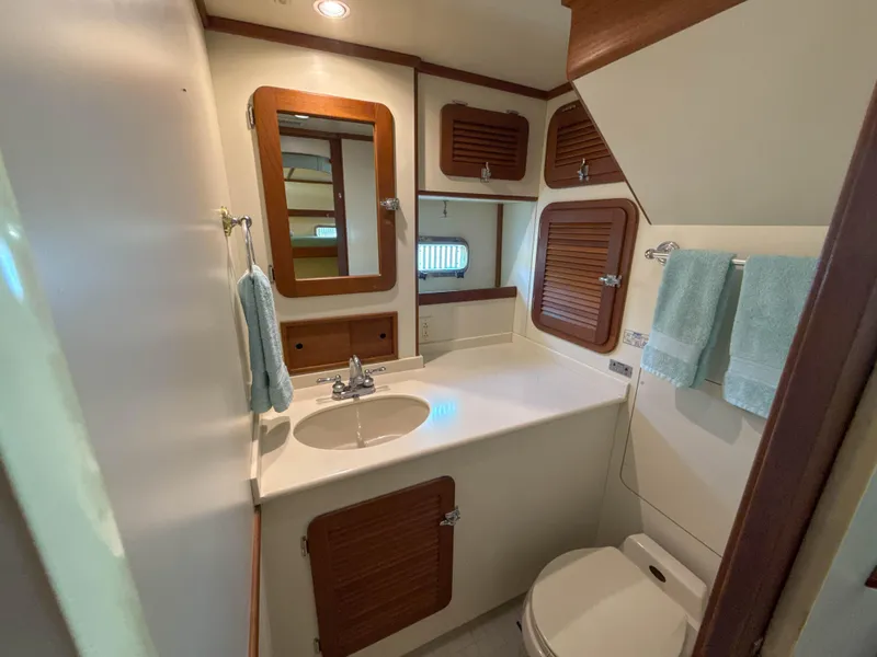Slide: The Image of Bathroom interior of 2000 Cherubini Independence yacht with wooden accents and modern fixtures. - 38