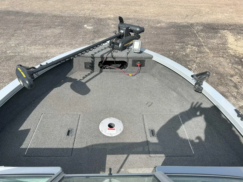 Slide: The Image of 2013 Lowe 185 Pro Series boat deck with trolling motor and shadow. - 5