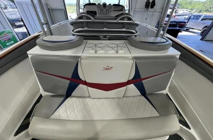 Slide: The Image of 2009 MasterCraft CSX 265 SS boat interior with stylish seating and modern design. - 9