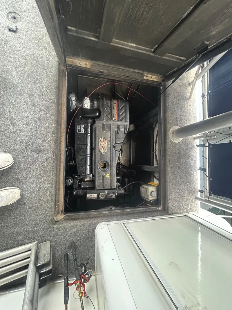 Slide: The Image of Engine compartment of a 2006 American Waterways Sweet Escape 4 shares boat. - 17