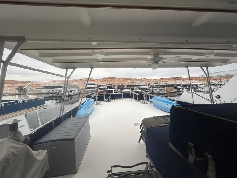 Slide: The Image of Houseboat deck view, American Waterways Sweet Escape 4 shares, 2006 model, docked at marina. - 20