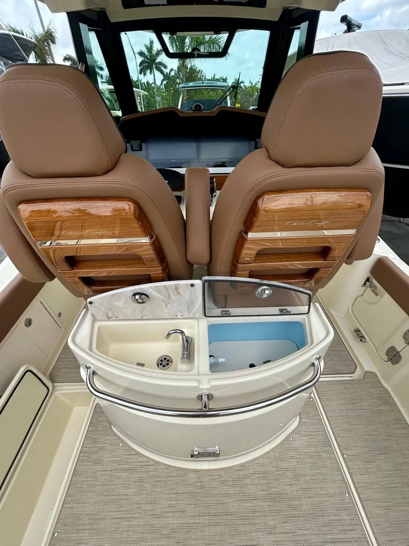 Slide: The Image of 2025 Chris-Craft 31 Catalina interior with luxurious seating and modern amenities. - 11