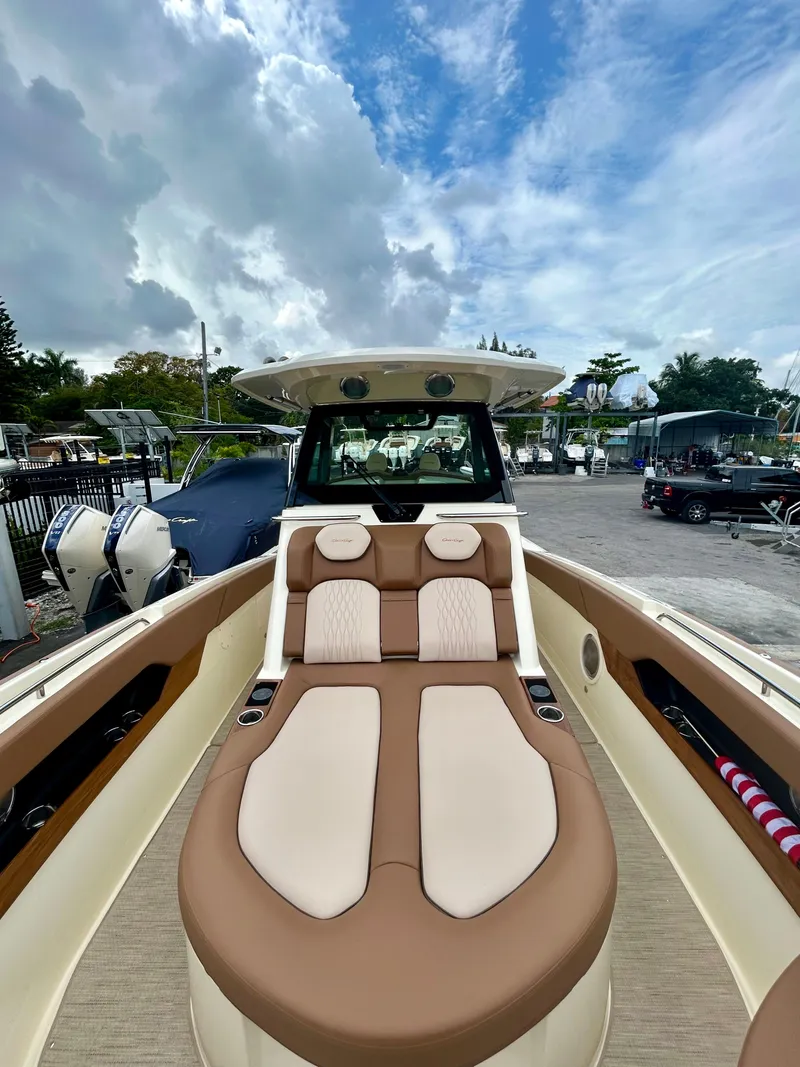 Slide: The Image of 2025 Chris-Craft 31 Catalina boat with luxurious seating and sleek design. - 12