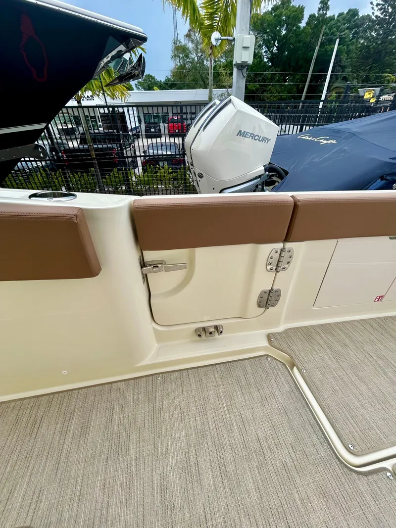 Slide: The Image of 2025 Chris-Craft 31 Catalina boat interior with Mercury engine, featuring sleek design and modern amenities. - 9