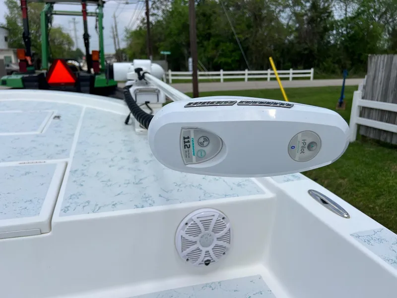 Slide: The Image of 2017 Shallow Sport 24 Sport boat with trolling motor and speaker on deck. - 17