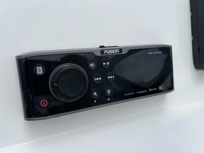 Slide: The Image of Fusion MS-UD750 marine stereo system on a 2017 Shallow Sport 24 Sport boat. - 18