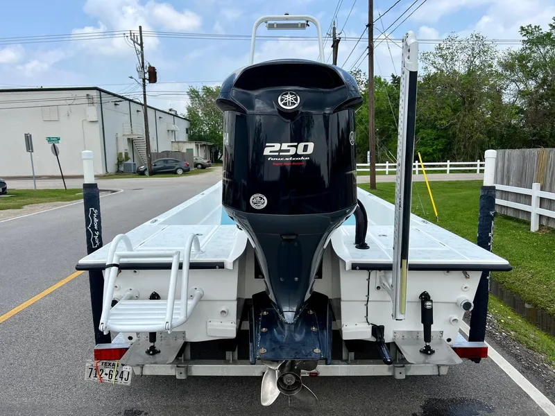 Slide: The Image of 2017 Shallow Sport 24 Sport boat with Yamaha 250 outboard motor on a street. - 3