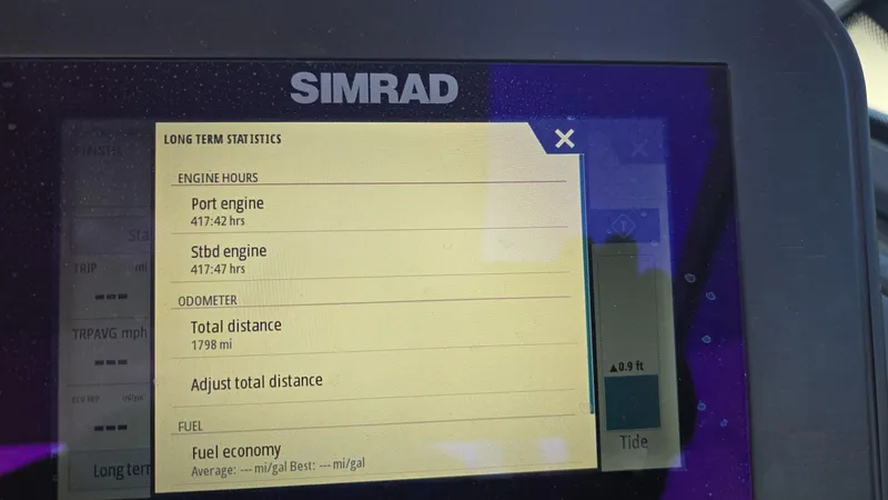 Slide: The Image of Simrad display showing engine hours and odometer for 2020 Aviara AV32 OB. - 17