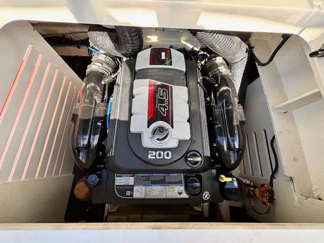 Slide: The Image of 2018 Sea Ray SPX 210 boat engine compartment with 4.5L 200 HP engine. - 5