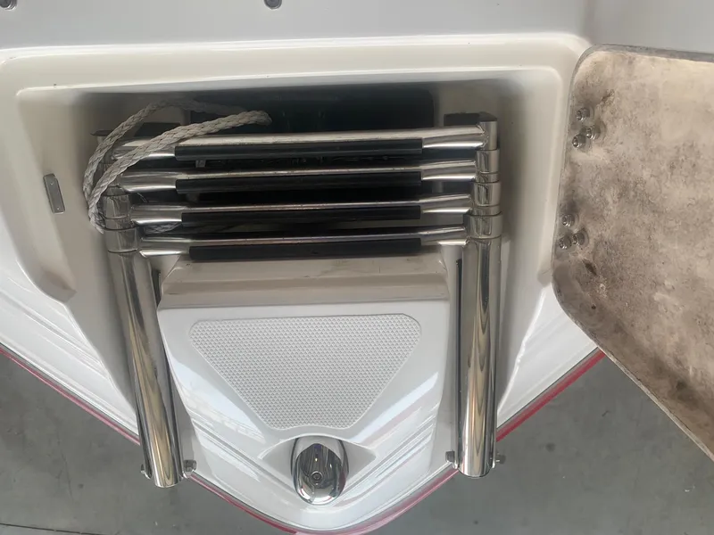 Slide: The Image of Folded boat ladder on a 2006 Bryant 206 BR. - 35