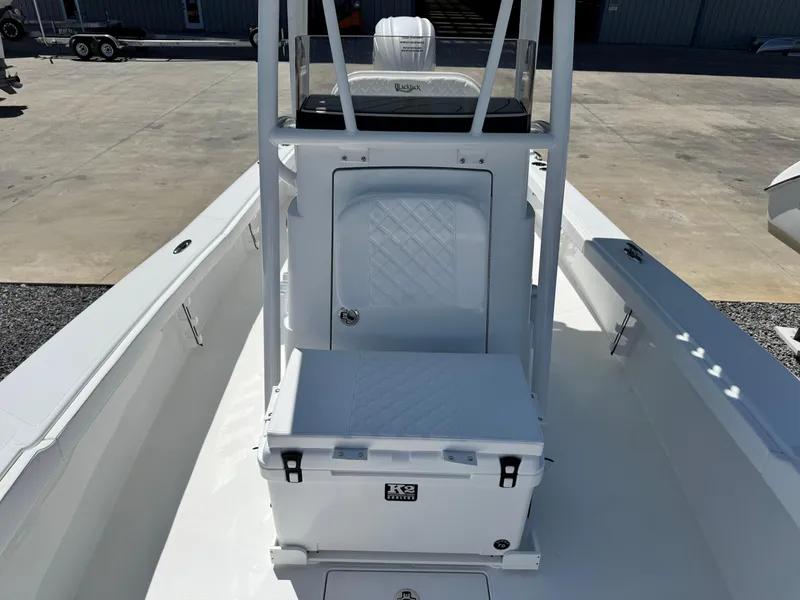 Slide: The Image of 2025 BlackJack 256 Coastal boat interior with console and storage. - 14
