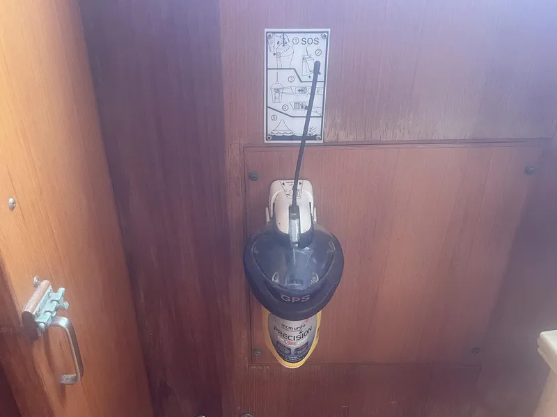 Slide: The Image of Emergency GPS device mounted on 1987 Jefferson 42 SE Sundeck Motor Yacht. - 24