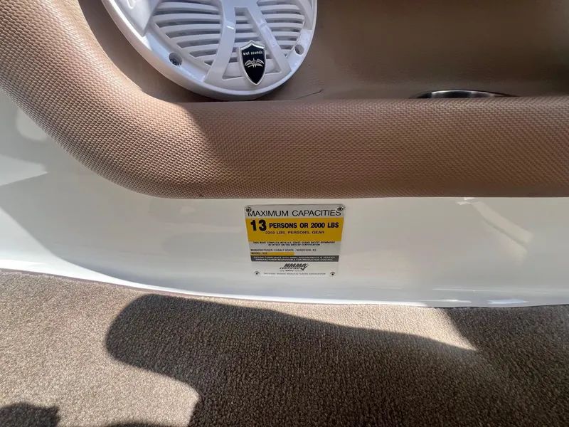 Slide: The Image of 2007 Cobalt 232 boat capacity label, 13 persons or 2000 lbs, interior detail. - 17