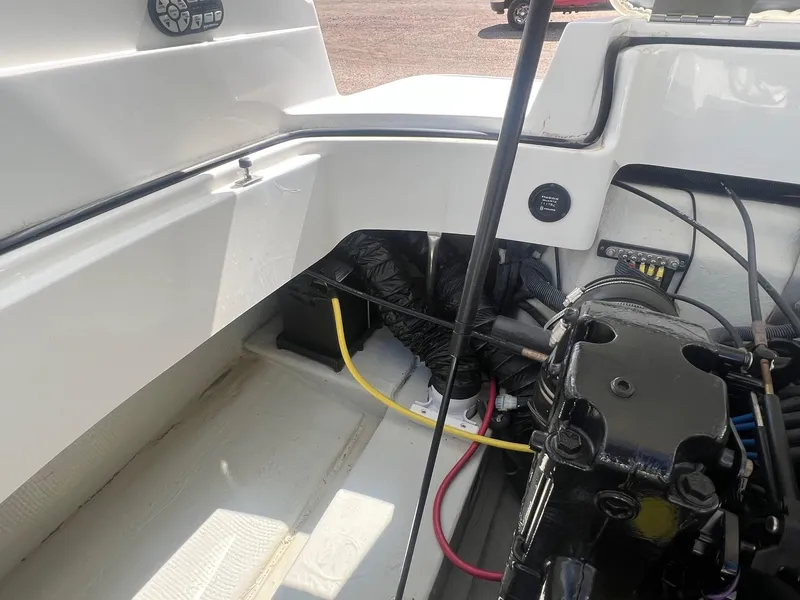 Slide: The Image of Engine compartment of a 2007 Cobalt 232 boat, showing wiring and components. - 31