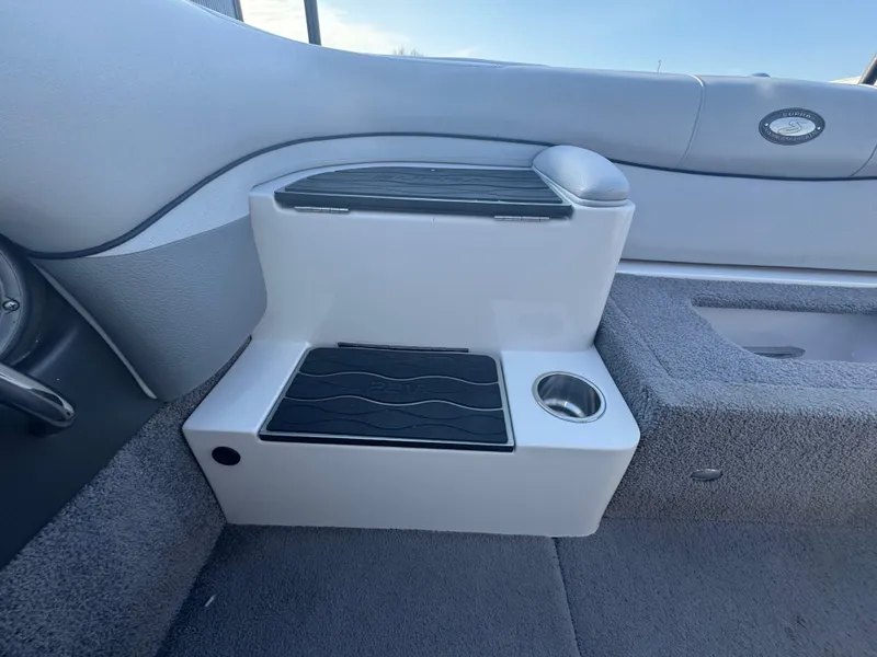 Slide: The Image of 2007 Supra 22SSV boat interior with step and cup holder. - 23